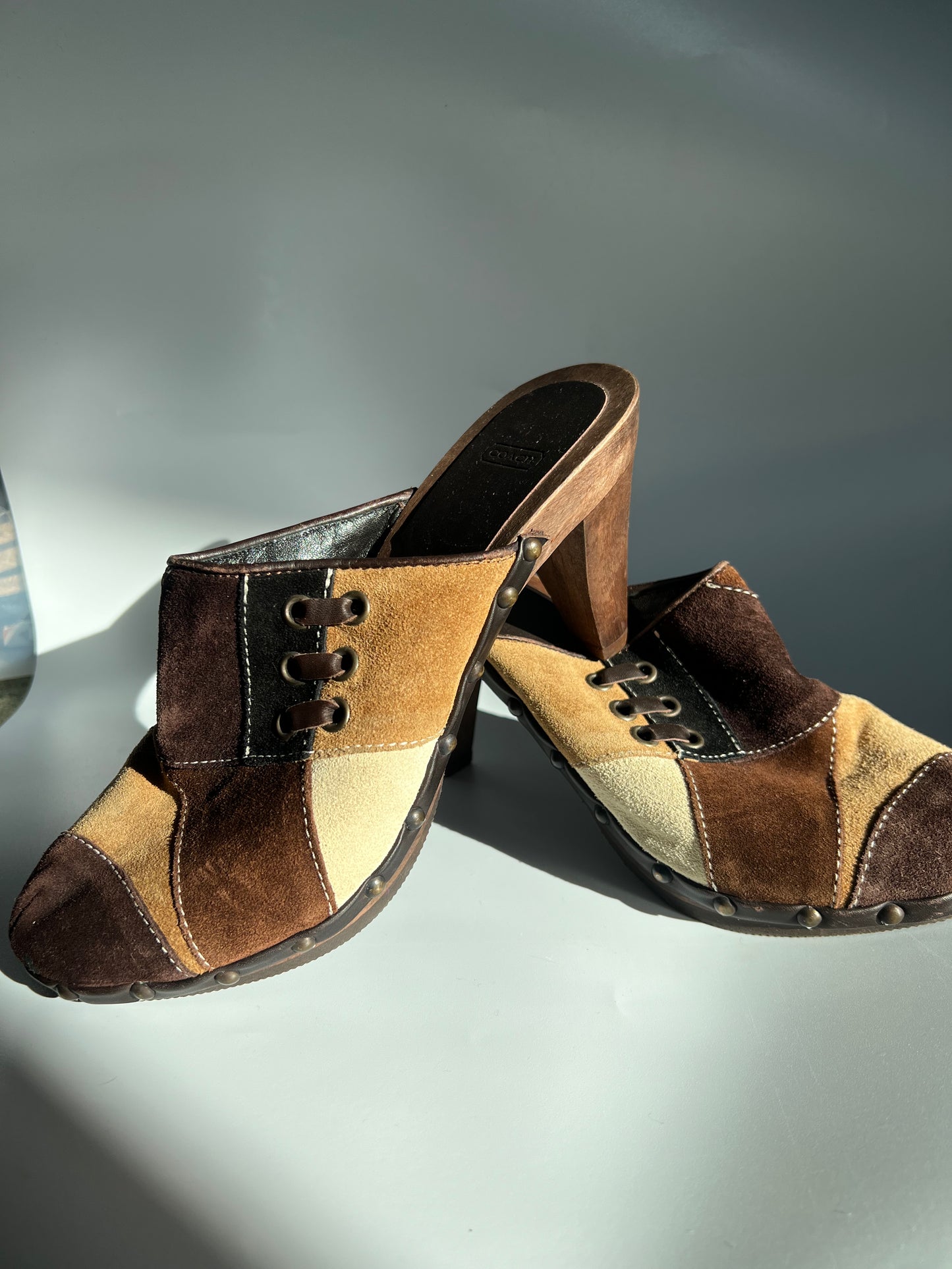COACH PATCHWORK CLOGS