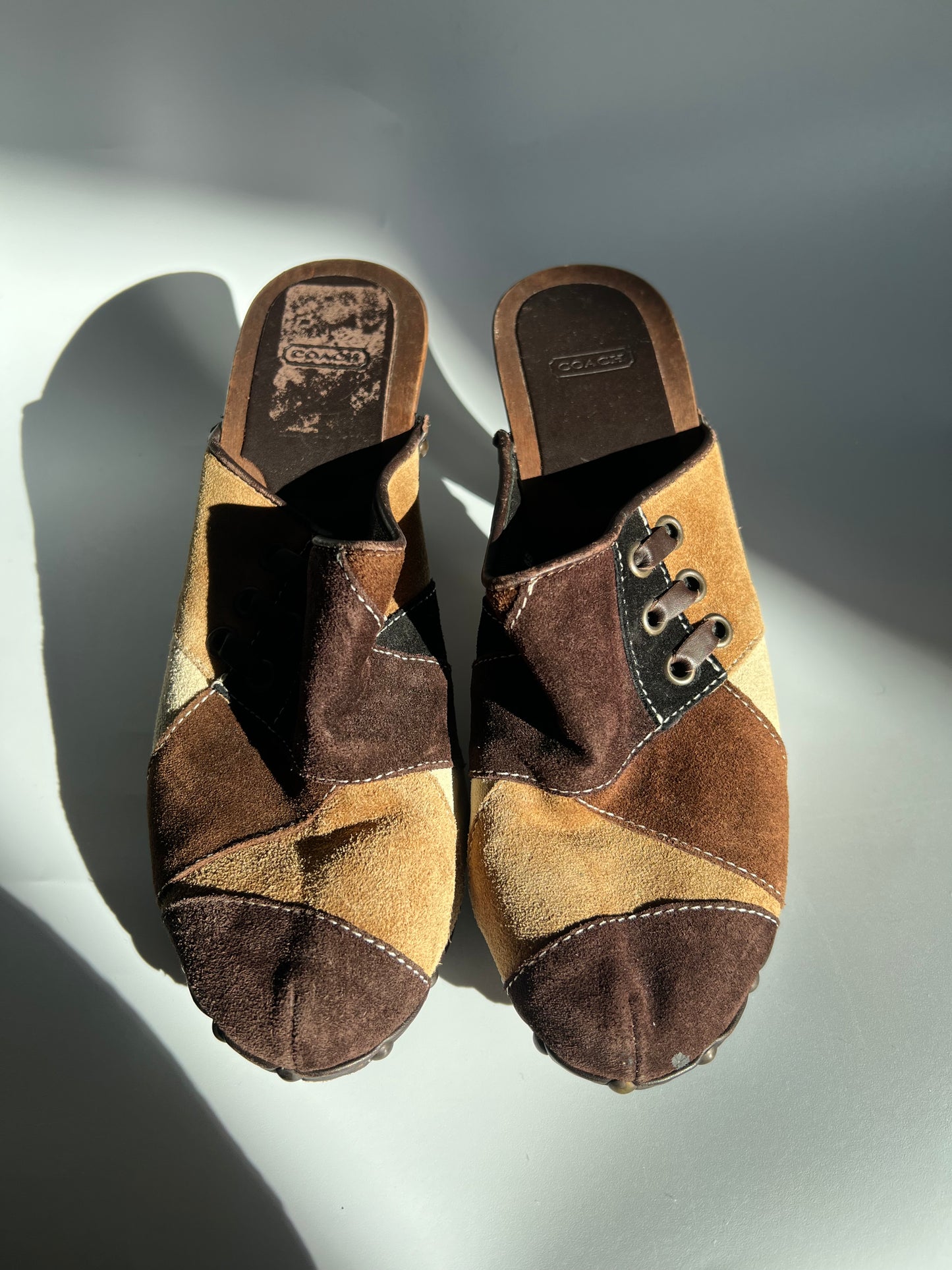 COACH PATCHWORK CLOGS