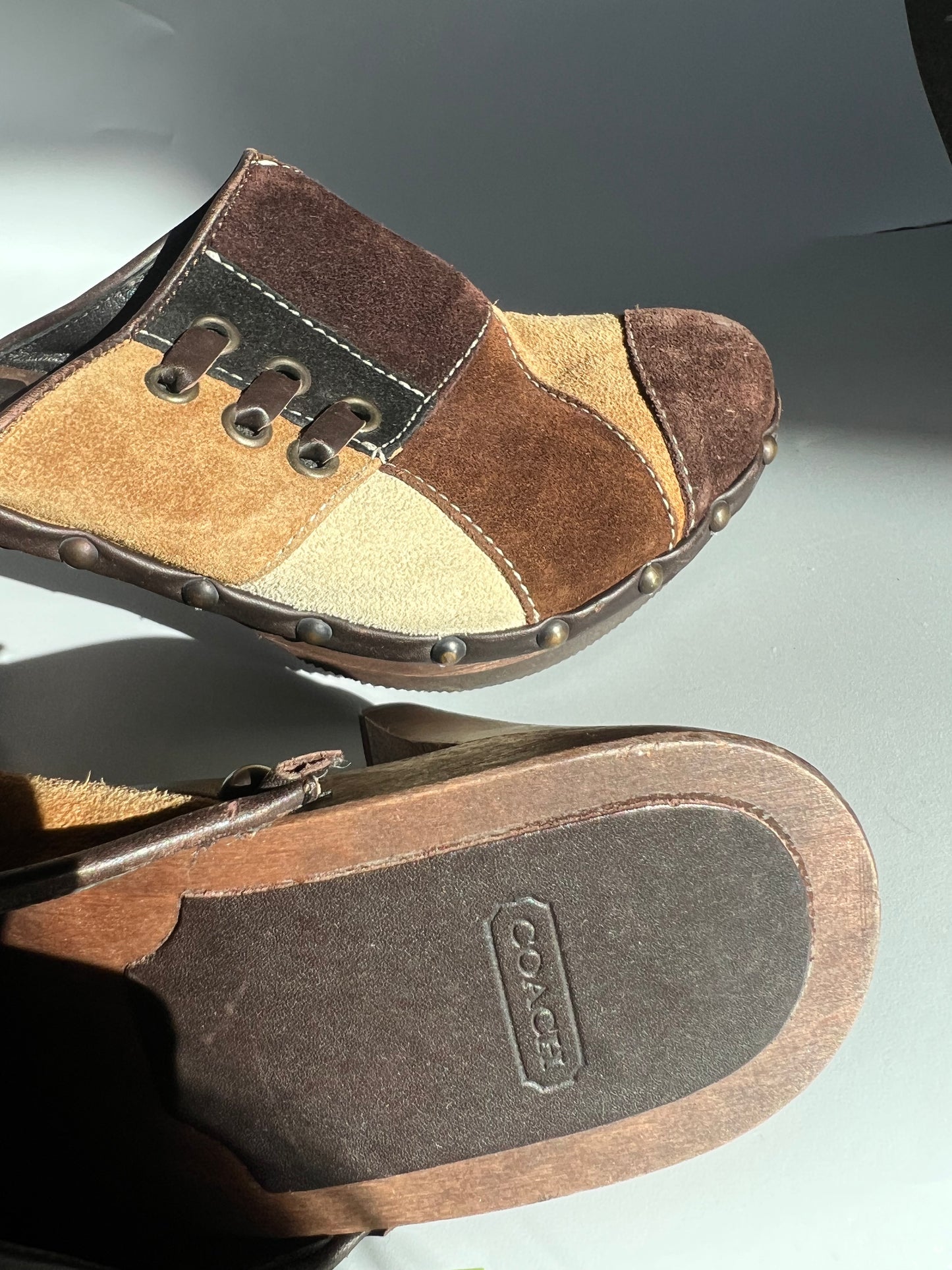 COACH PATCHWORK CLOGS