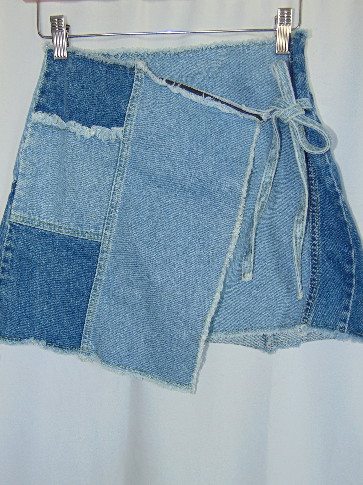 ASYMMETRICAL DENIM PATCHWORK MINI SKIRT