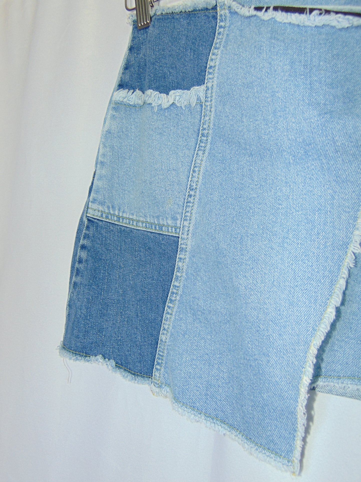 ASYMMETRICAL DENIM PATCHWORK MINI SKIRT