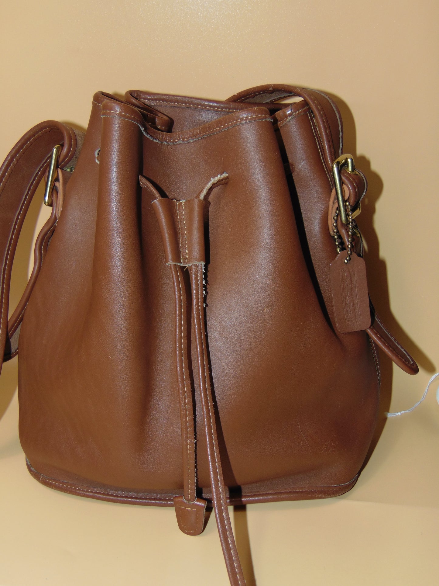 VINTAGE COACH DRAWSTRING BUCKET BAG